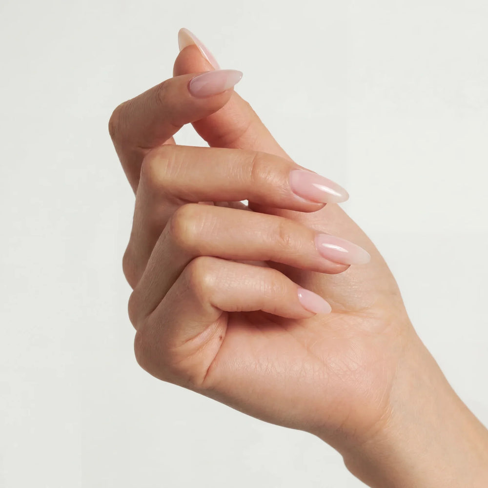 Hand showcasing GLAMRDiP gel nails